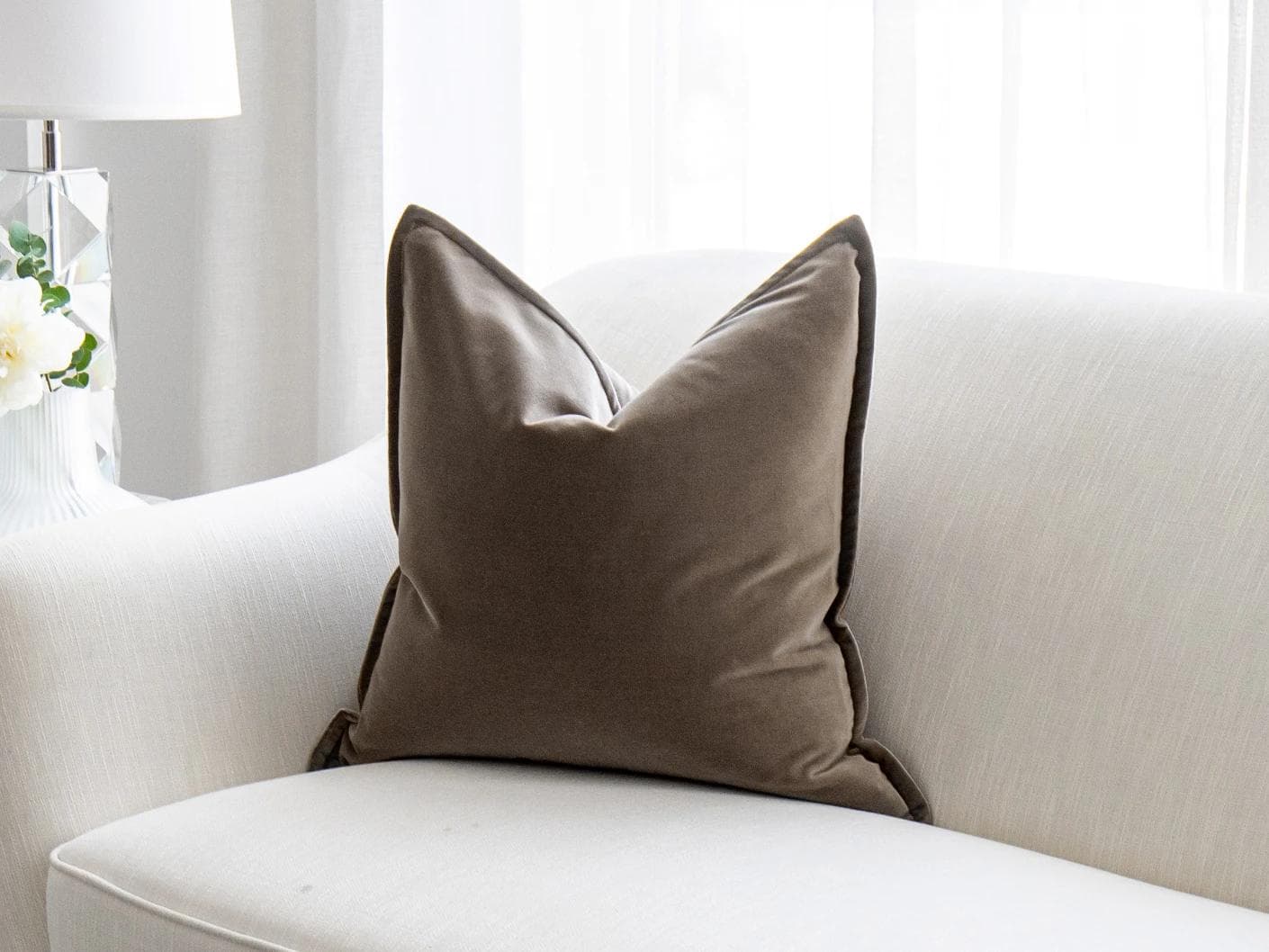 Alessandra Braun cushion in brown, shown in a lifestyle right view as image 2