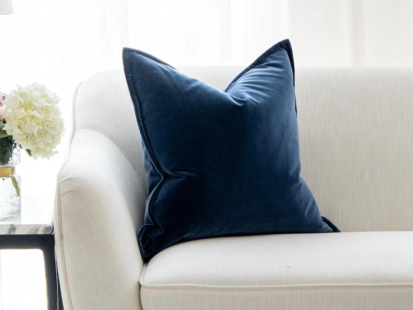 Alessandra Canova cushion in royal blue and blue, shown in a lifestyle front view as image 4