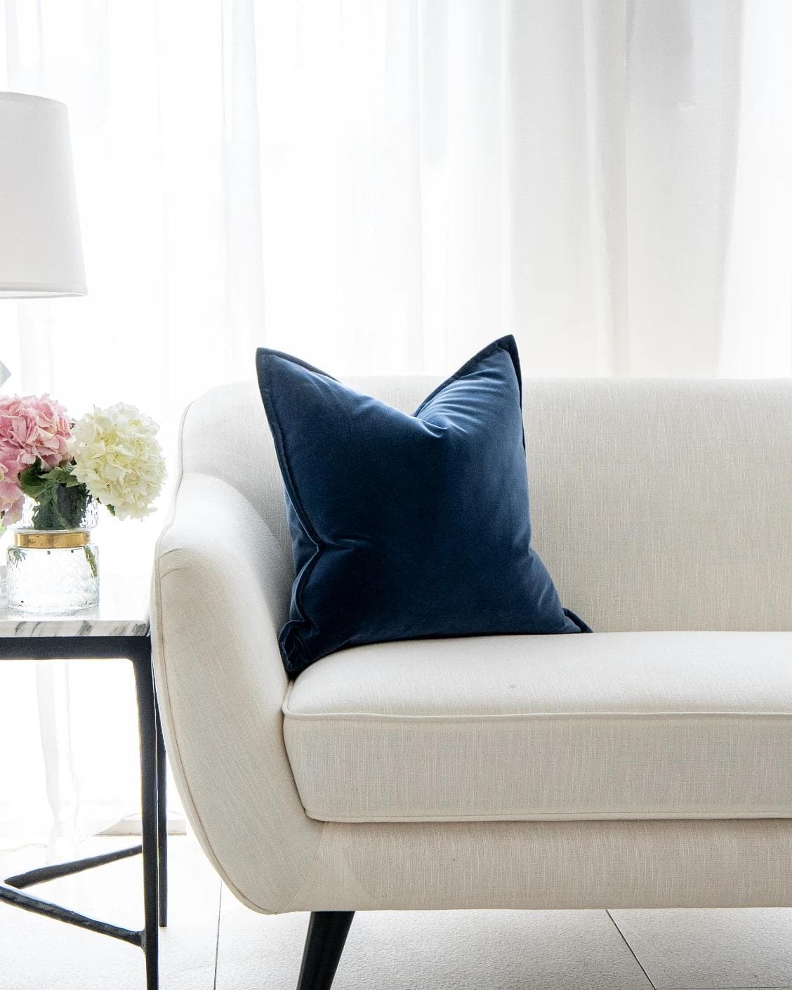Alessandra Canova cushion in royal blue and blue, shown in a lifestyle front view as image 4