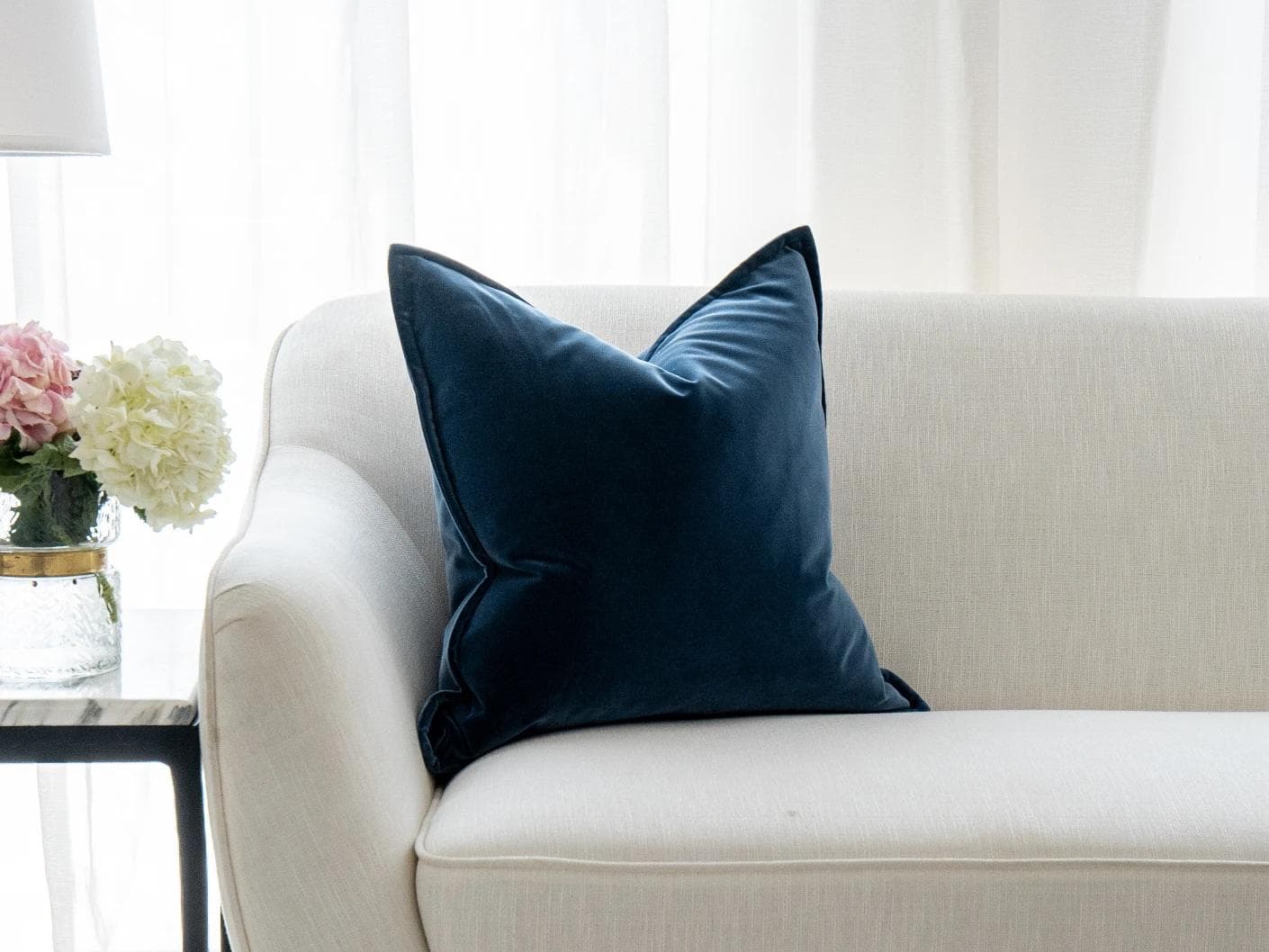 Alessandra Canova cushion in royal blue and blue, shown in a lifestyle front view as image 5