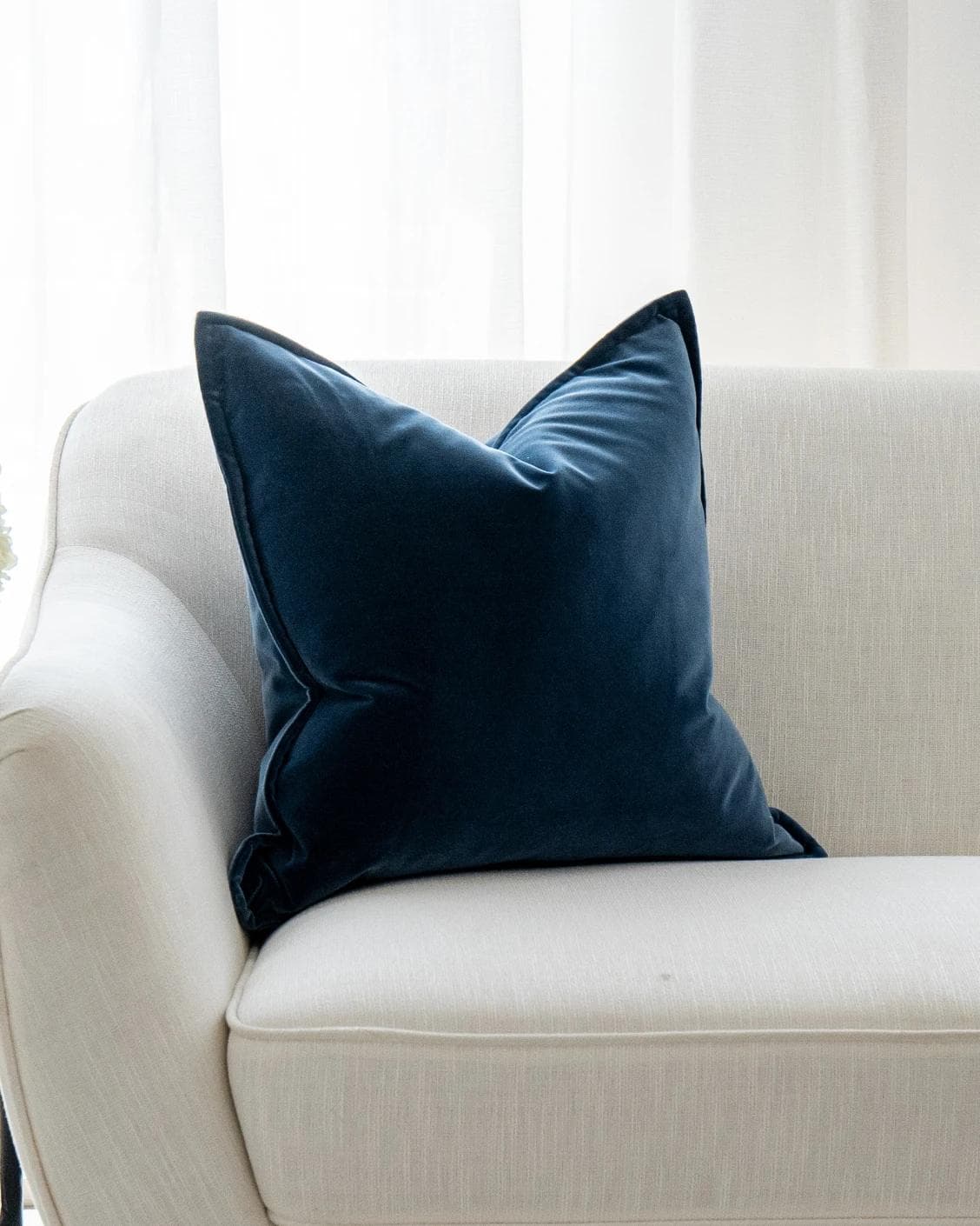 Alessandra Canova cushion in royal blue and blue, shown in a lifestyle front view as image 5