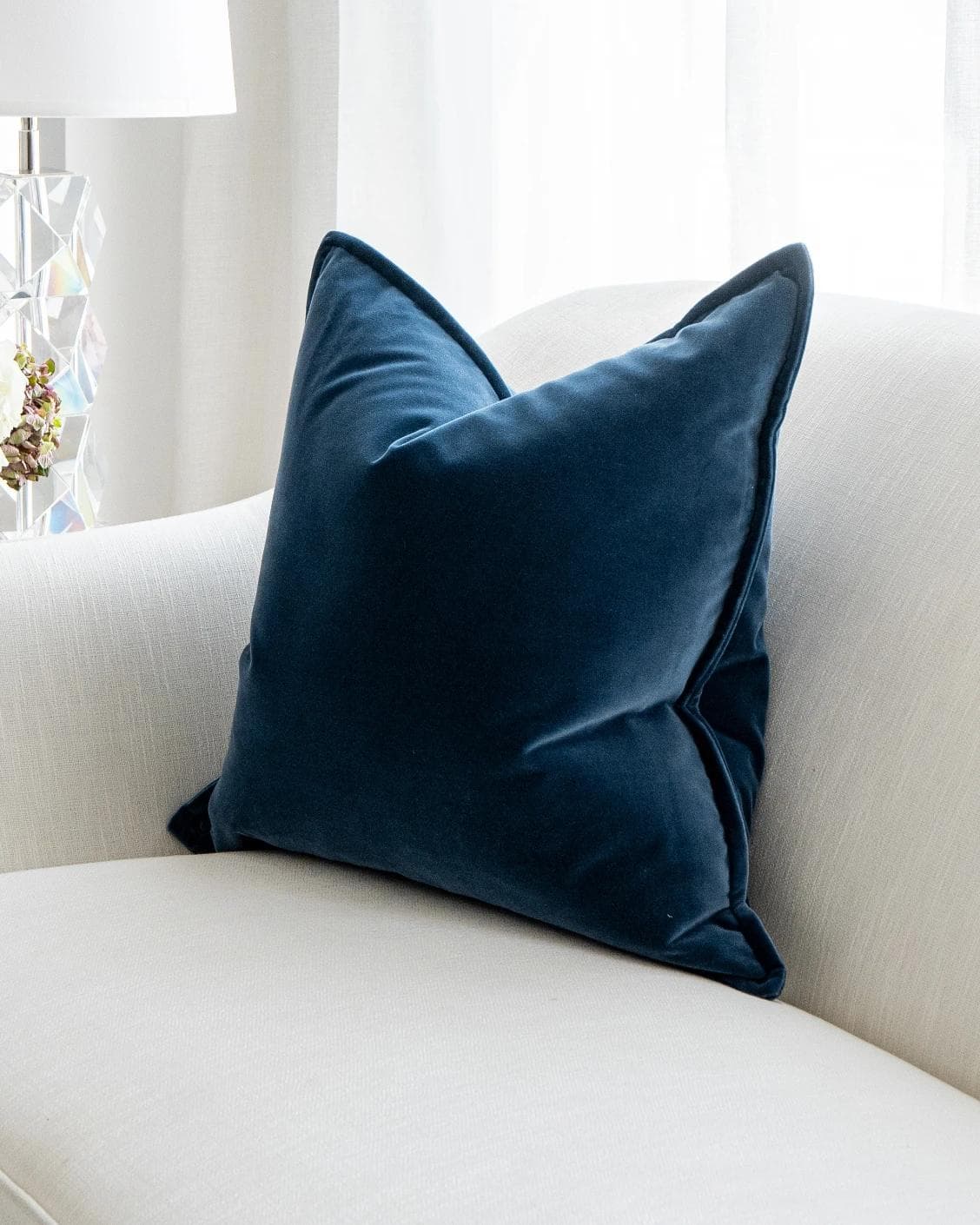 Alessandra Canova cushion in royal blue and blue, shown in a lifestyle front view as image 2