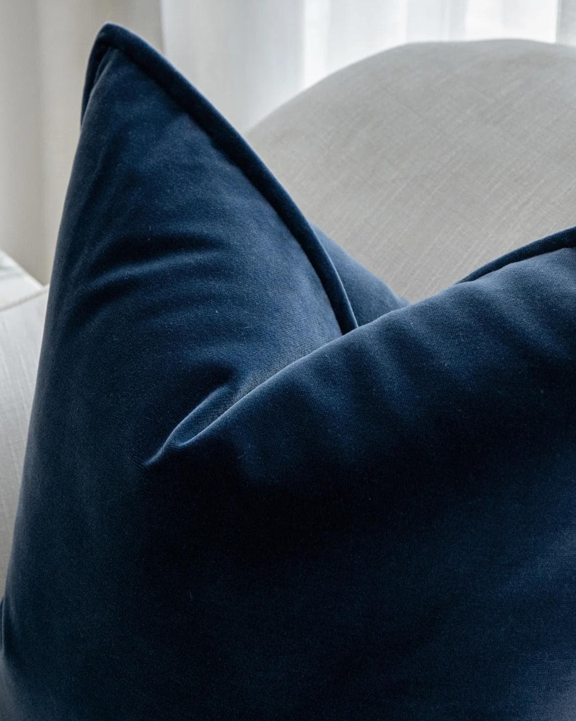 Alessandra Canova cushion in royal blue and blue, shown in a lifestyle top view as image 7