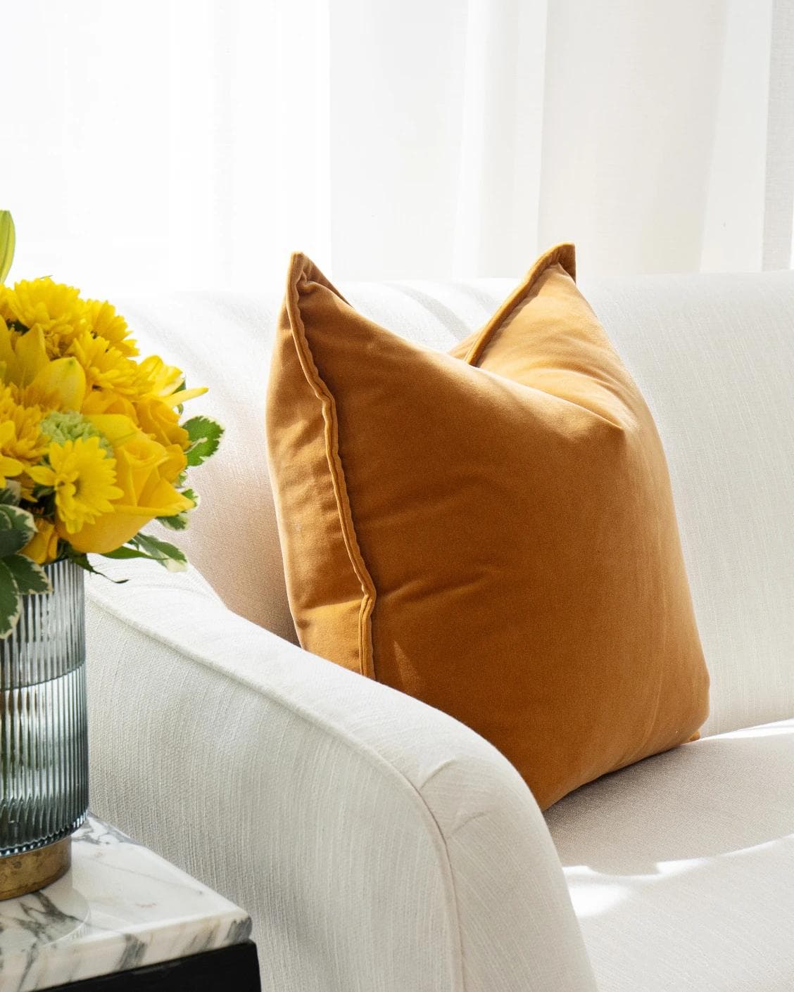 Alessandra Hodler cushion in orange, shown in a lifestyle left view as image 6