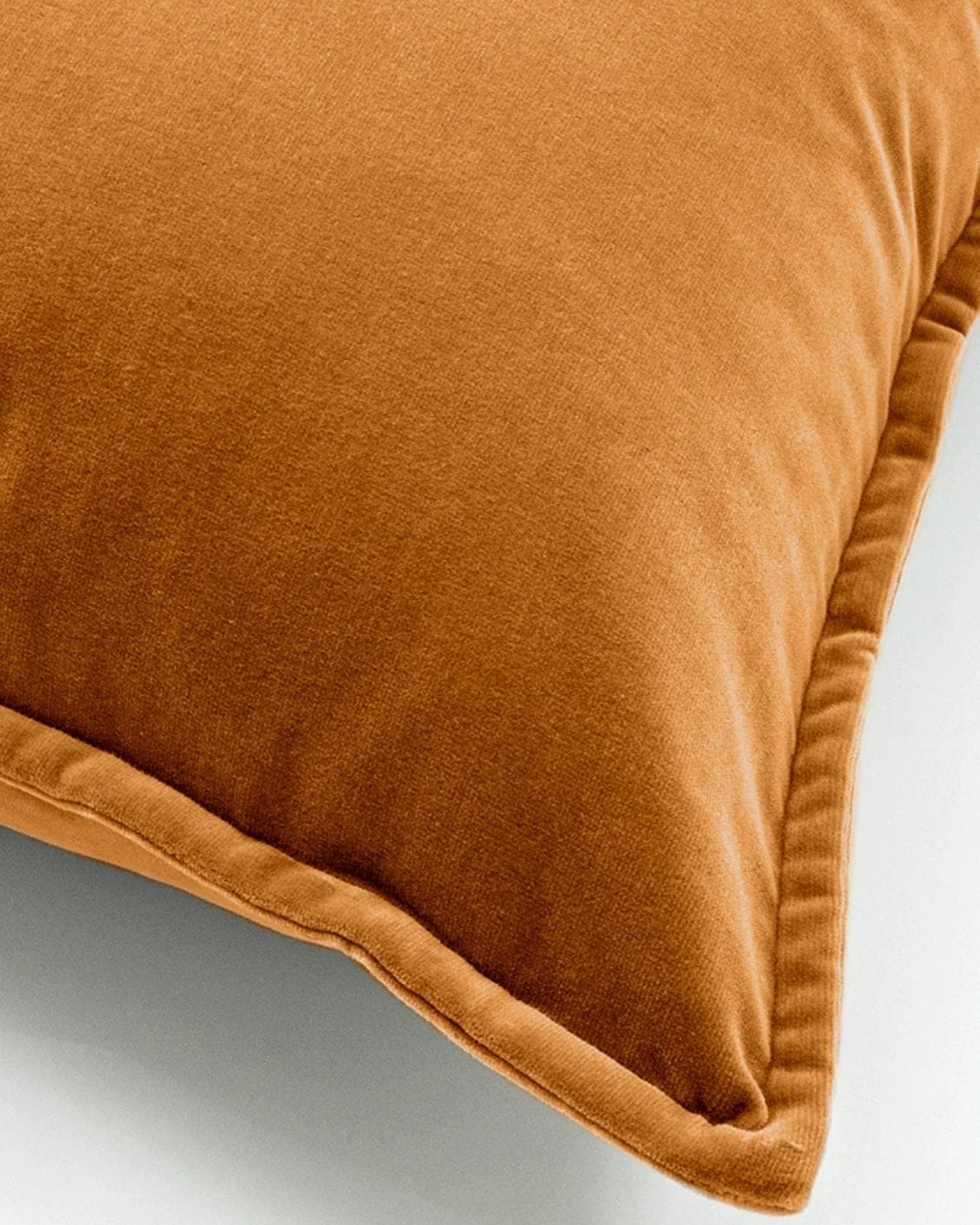 Alessandra Hodler cushion in orange, shown in a product top view as image 8