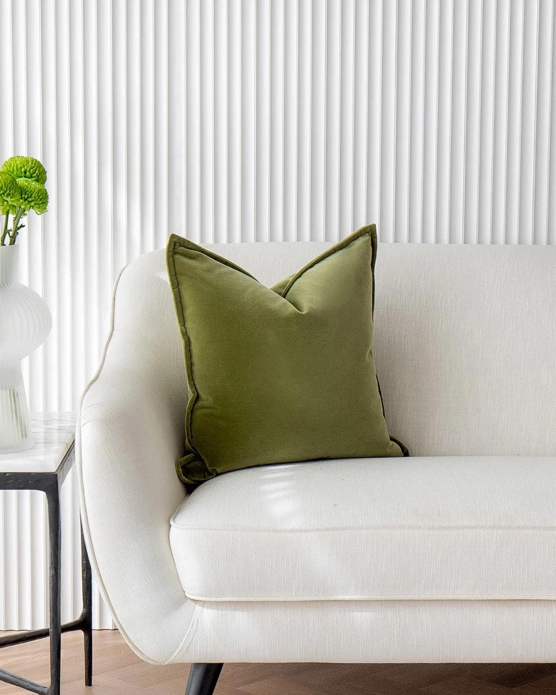 Alessandra Jade cushion in green, shown in a lifestyle front view as image 4