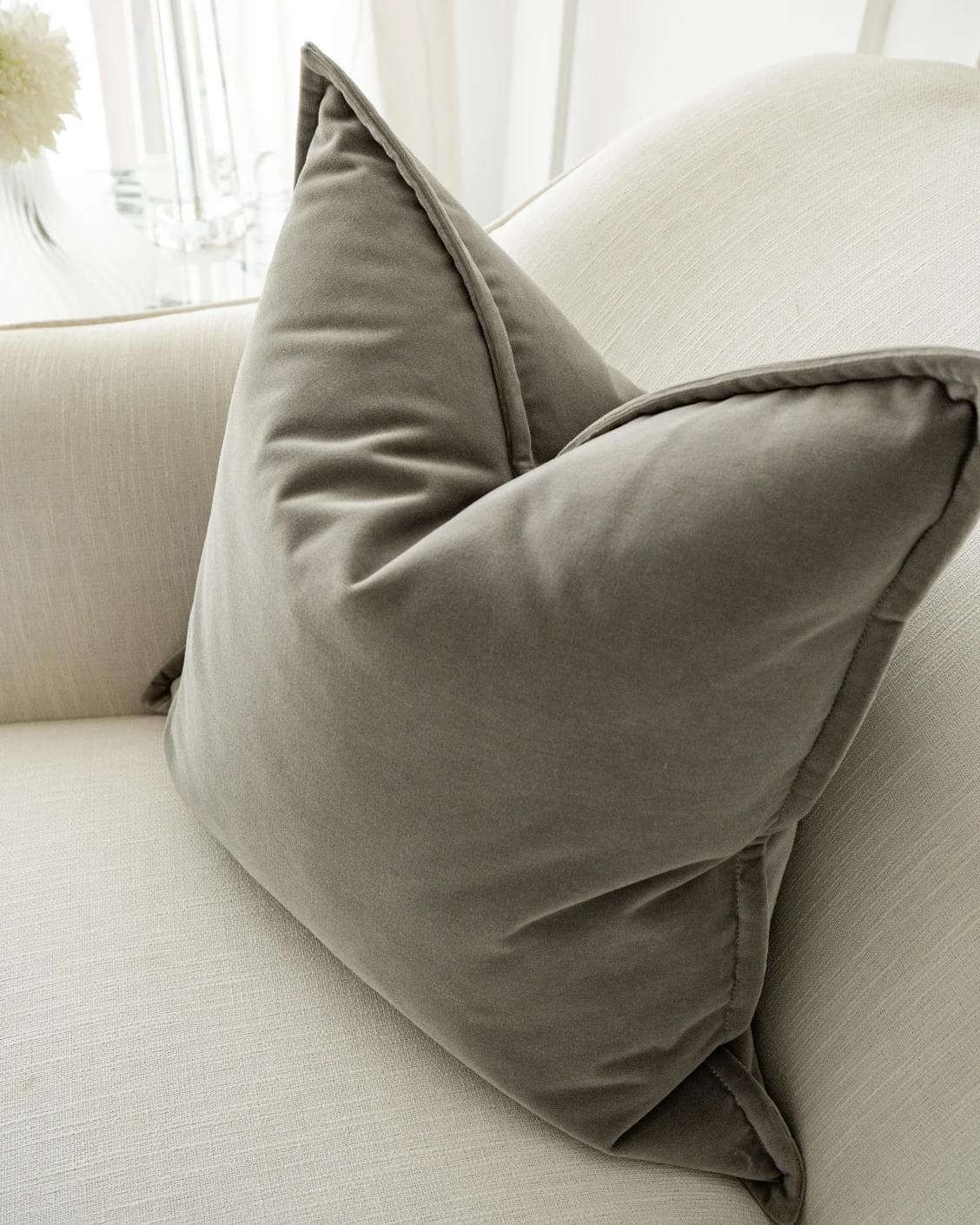 Alessandra Laurent cushion in grey, shown in a lifestyle top view as image 6