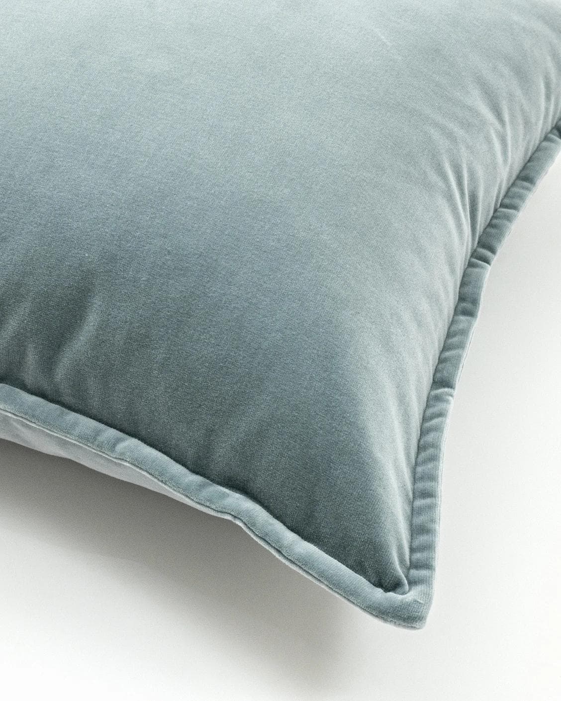 Alessandra Lucas cushion in pastel blue and blue, shown in a product close-up as image 6