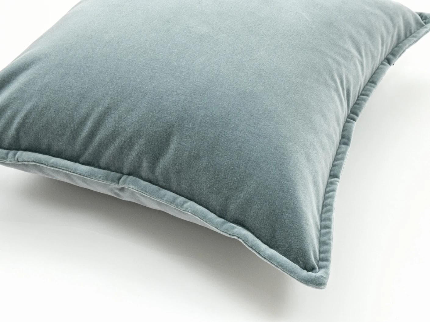 Alessandra Lucas cushion in pastel blue and blue, shown in a product close-up as image 6