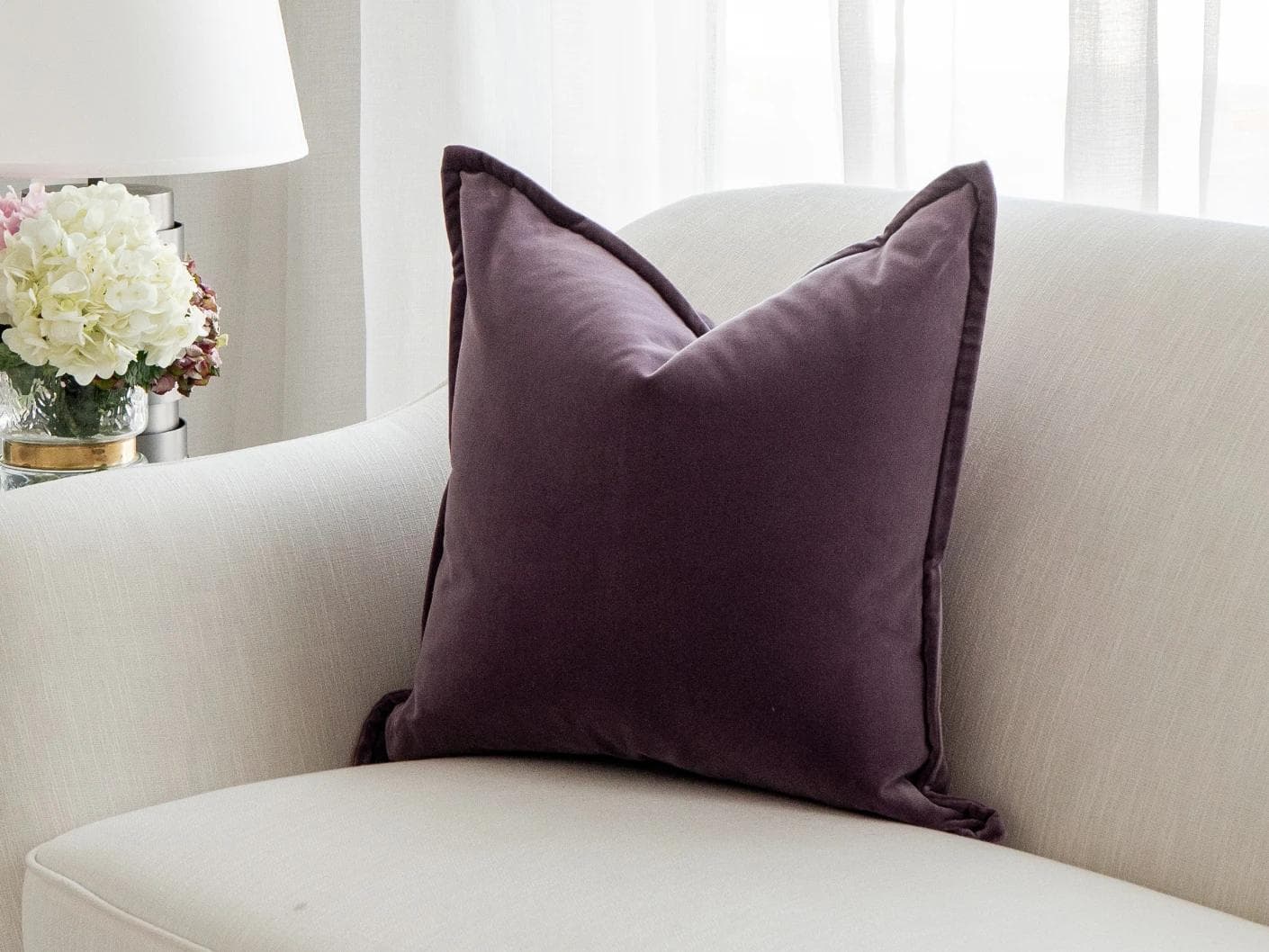 Alessandra Mauveine cushion in purple, shown in a lifestyle right view as image 2