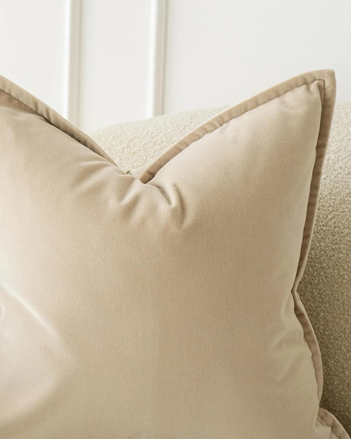 Alessandra River cushion in beige, shown in a lifestyle front view as image 4
