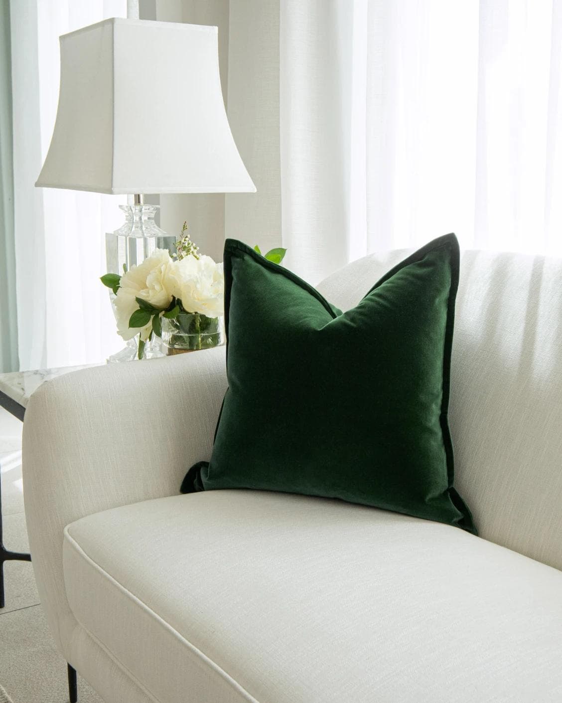 Alessandra Russel cushion in dark green and green, shown in a lifestyle right view as image 2