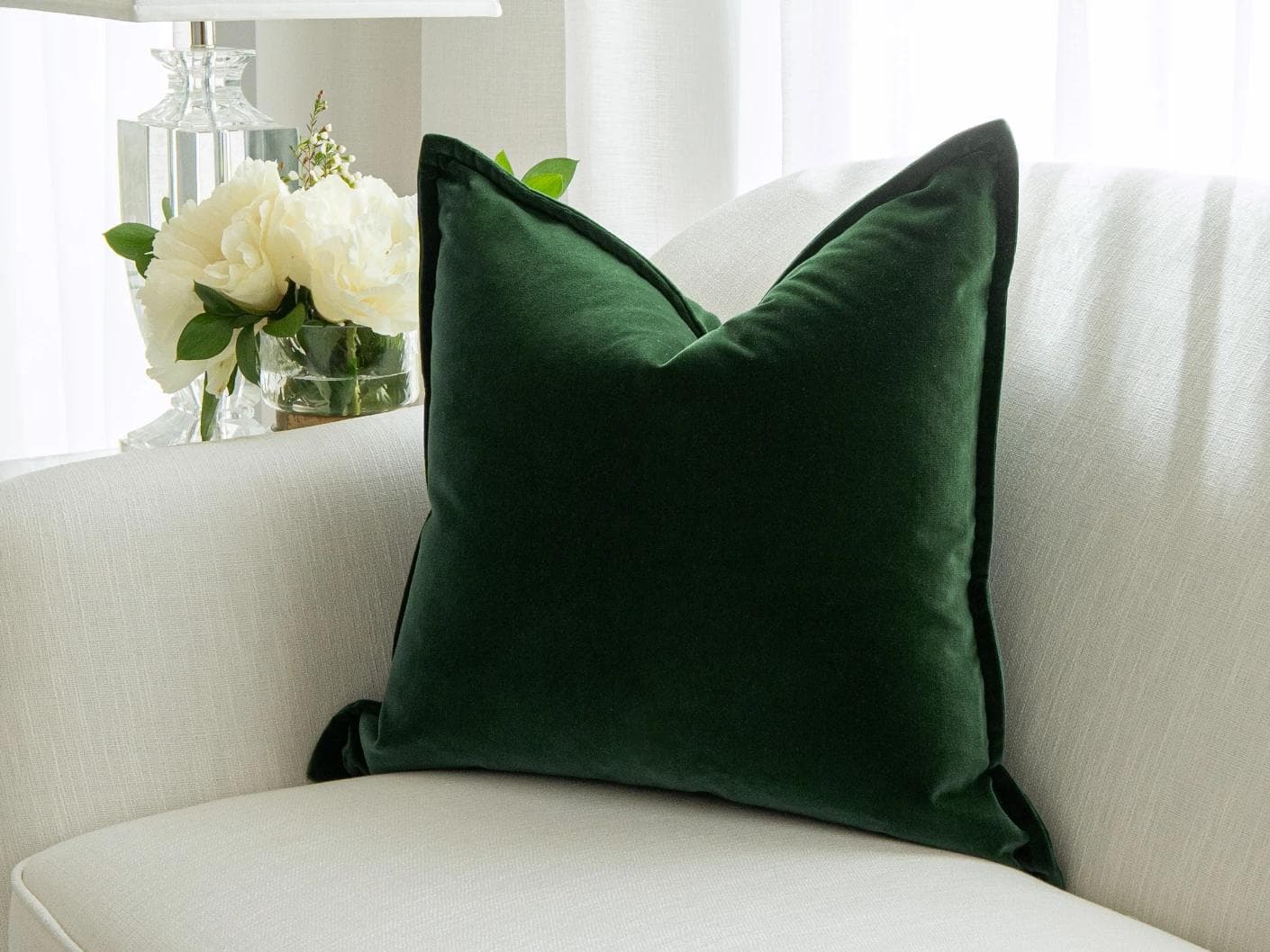 Alessandra Russel cushion in dark green and green, shown in a lifestyle right view as image 2