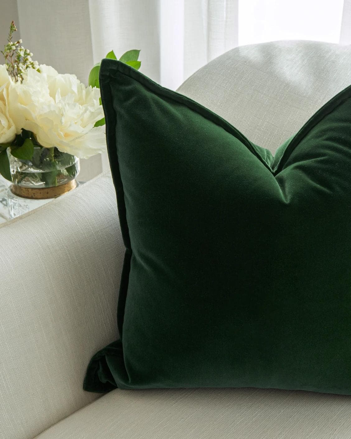 Alessandra Russel cushion in dark green and green, shown in a lifestyle top view as image 5
