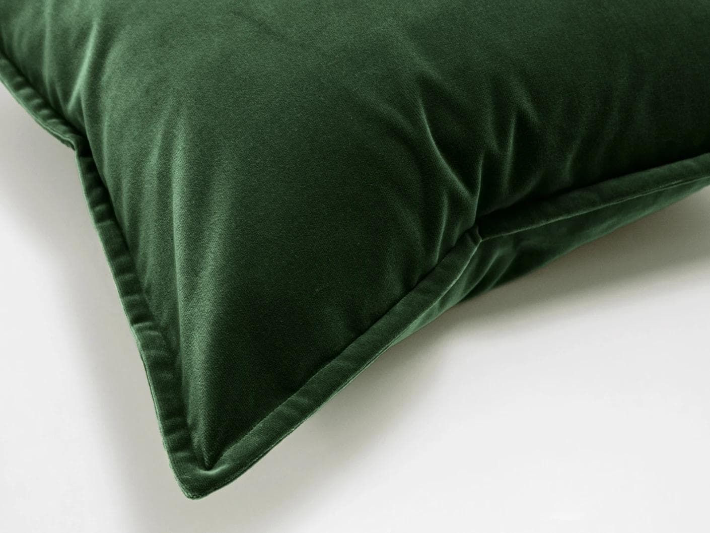Alessandra Russel cushion in dark green and green, shown in a product close-up as image 6