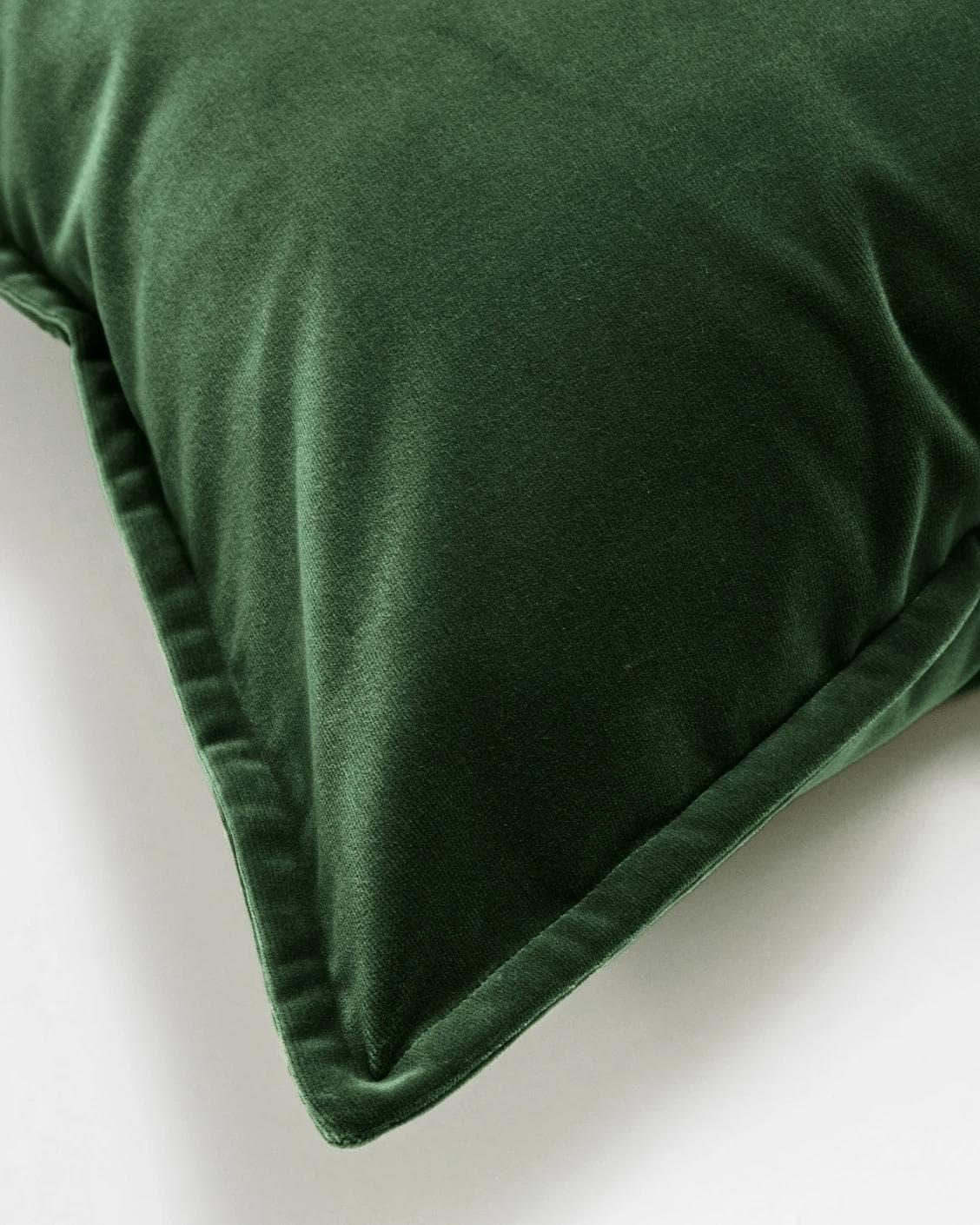 Alessandra Russel cushion in dark green and green, shown in a product close-up as image 6