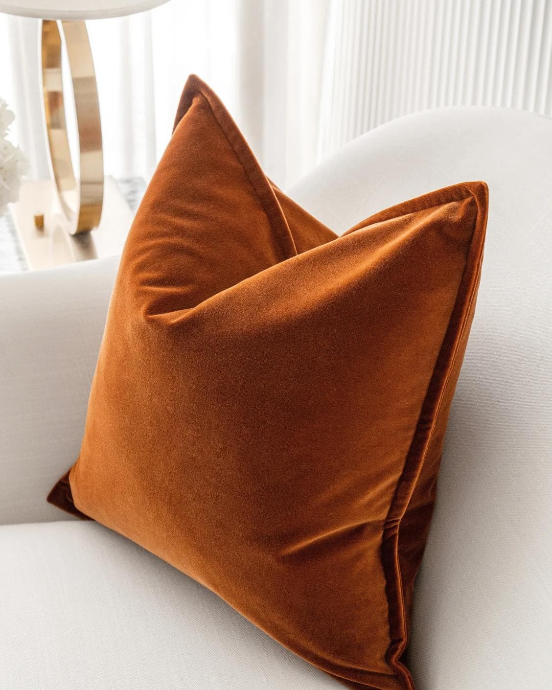 Alessandra Rust cushion in orange, shown in a lifestyle right view as image 6