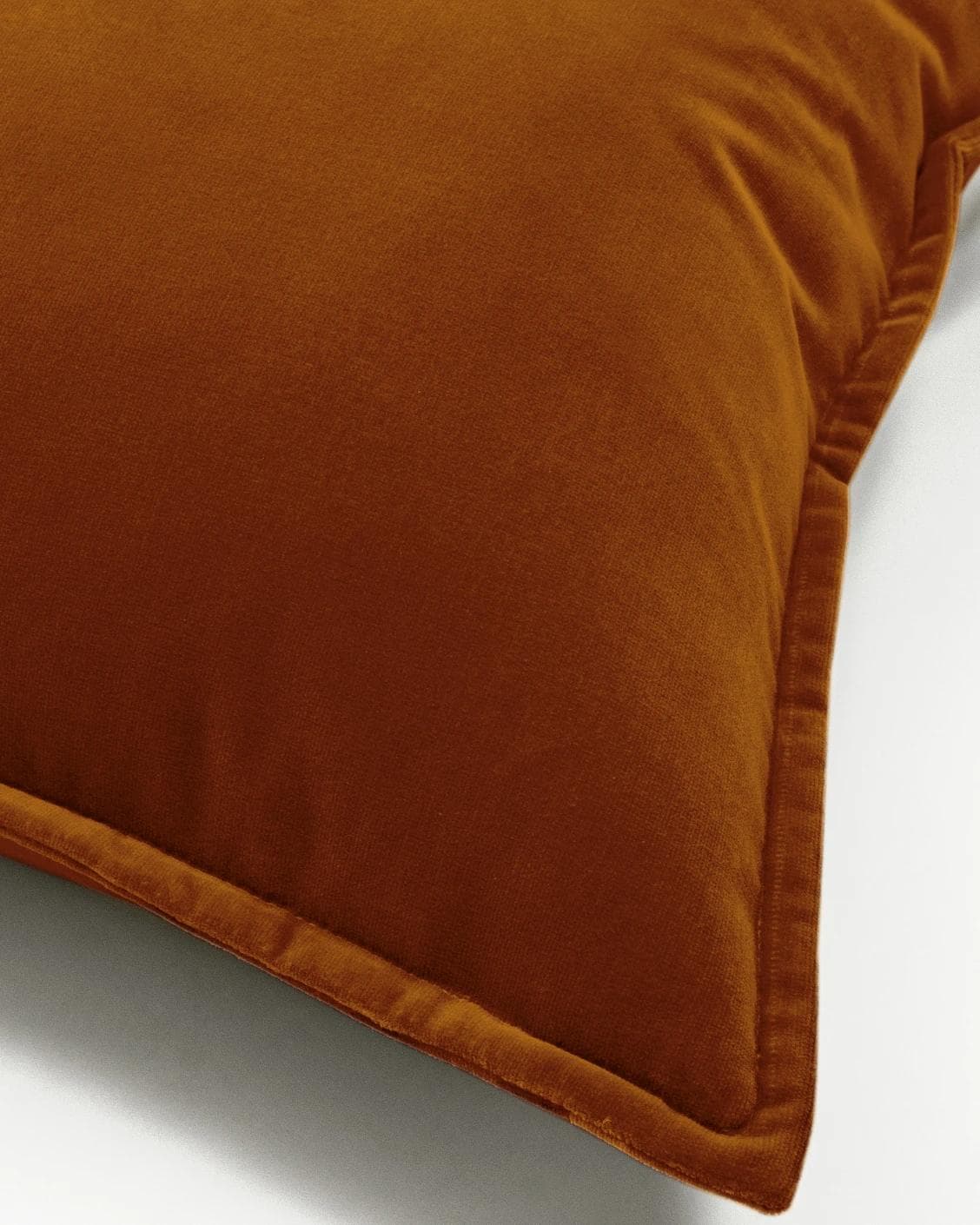 Alessandra Rust cushion in orange, shown in a product top view as image 3