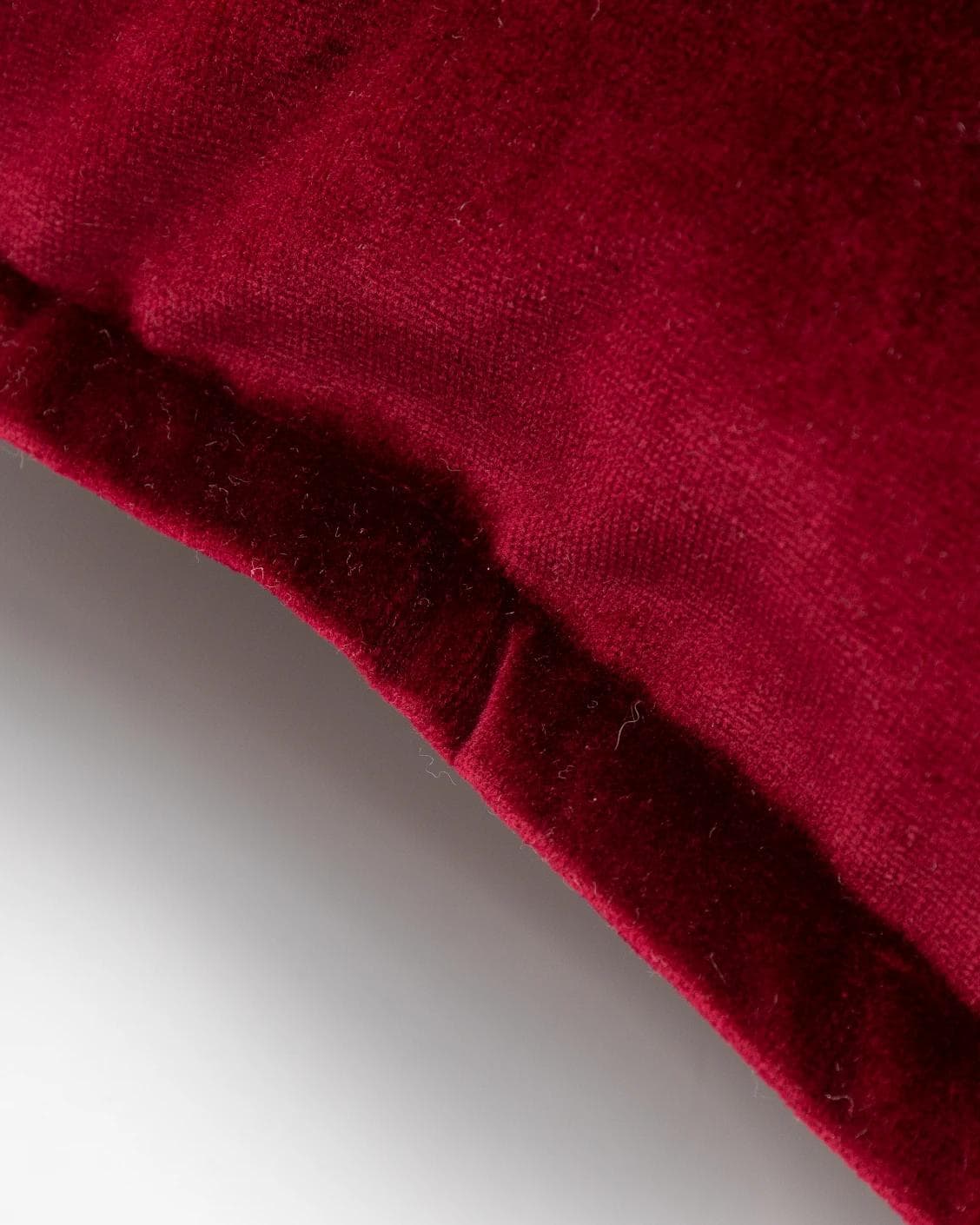 Alessandra Scarlet cushion in red, shown in a product close-up as image 6