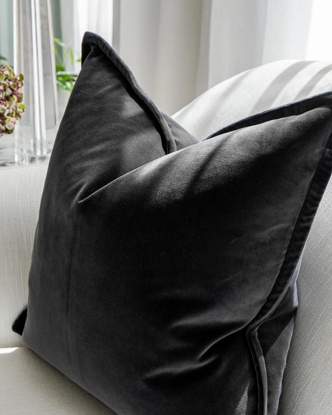 Alessandra Steele cushion in charcoal and grey, shown in a lifestyle close-up as image 4