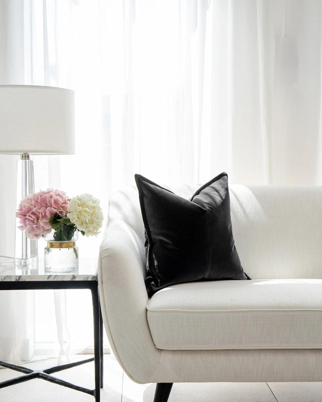 Alessandra Steele cushion in charcoal and grey, shown in a lifestyle front view as image 5