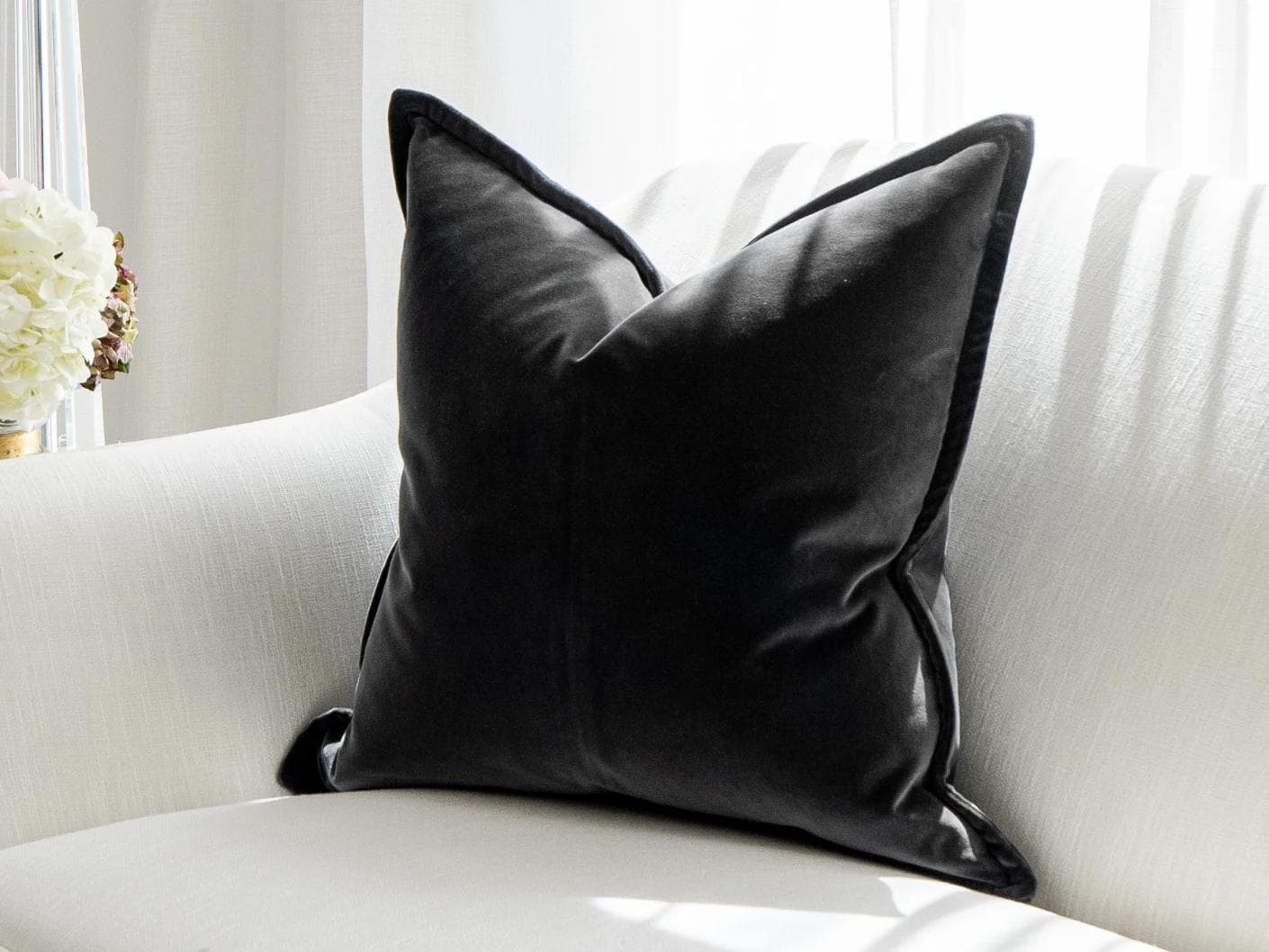 Alessandra Steele cushion in charcoal and grey, shown in a lifestyle right view as image 2