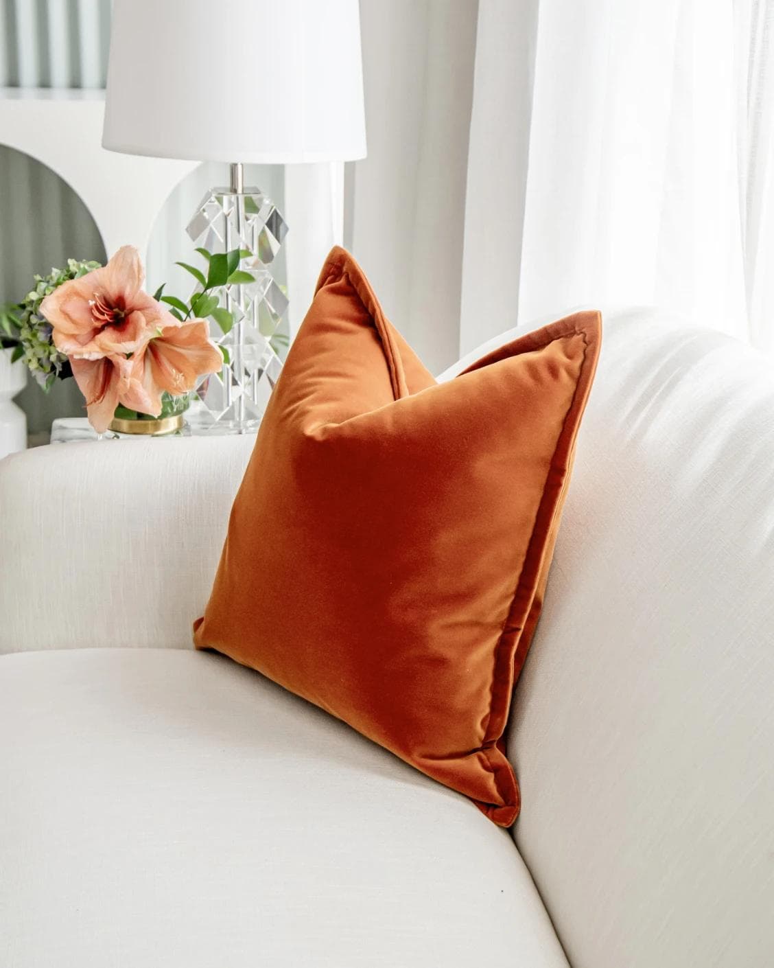 Alessandra Tangelo cushion in orange, shown in a lifestyle right view as image 6