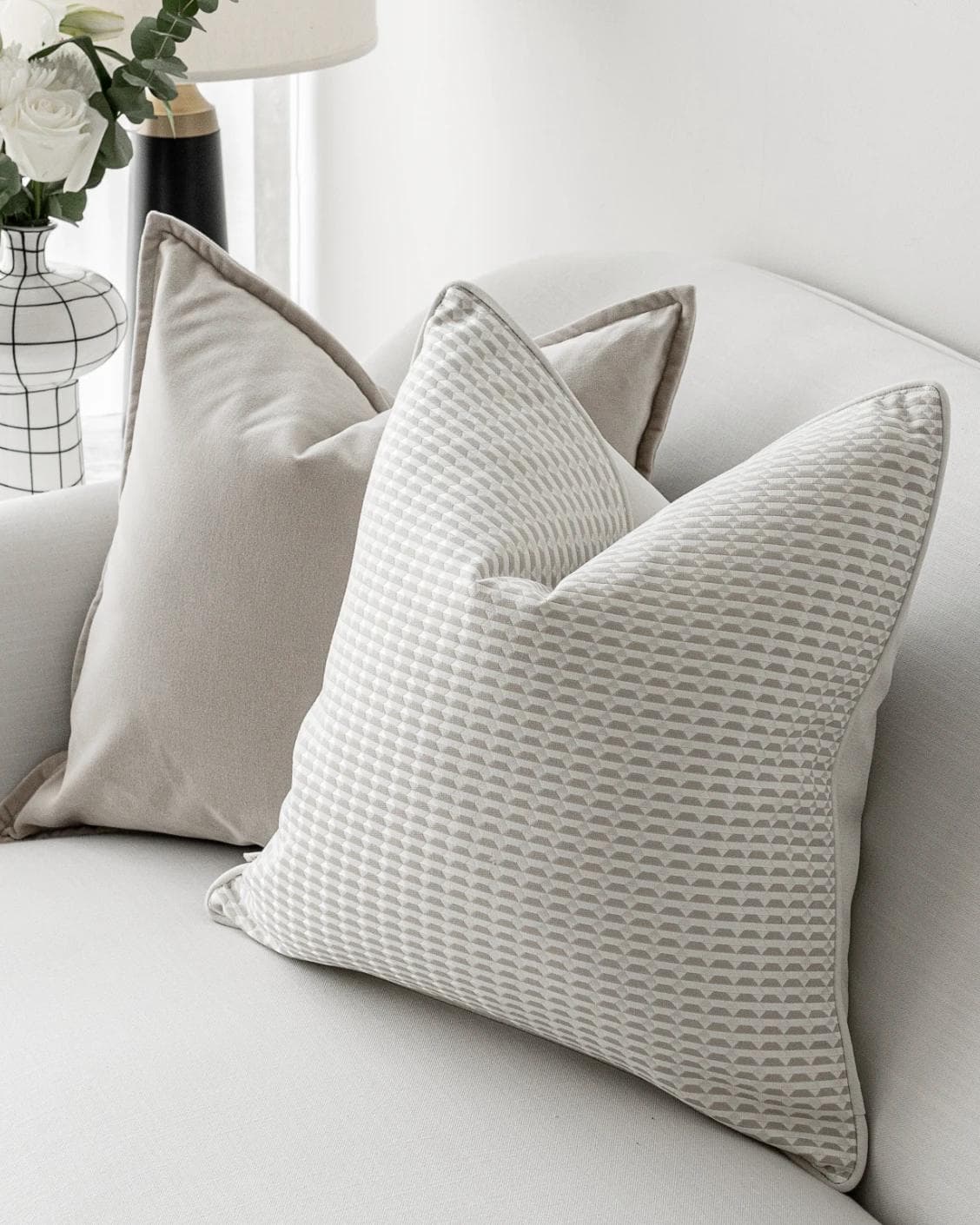 Alex Bundle cushion in beige and white, shown in a lifestyle right view as image 7