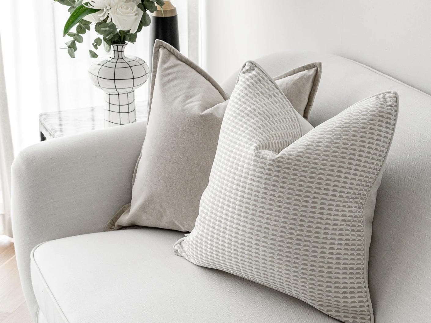 Alex Bundle cushion in beige and white, shown in a lifestyle right view as image 7