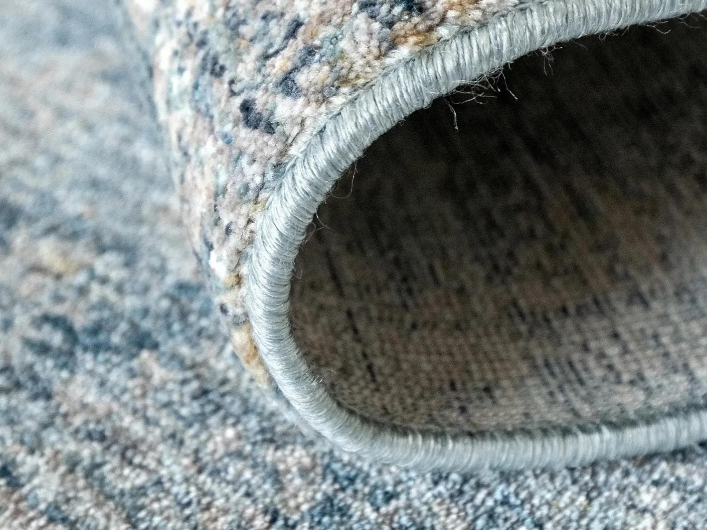 Alexander Azure carpets in blue, shown in a product close-up as image 2