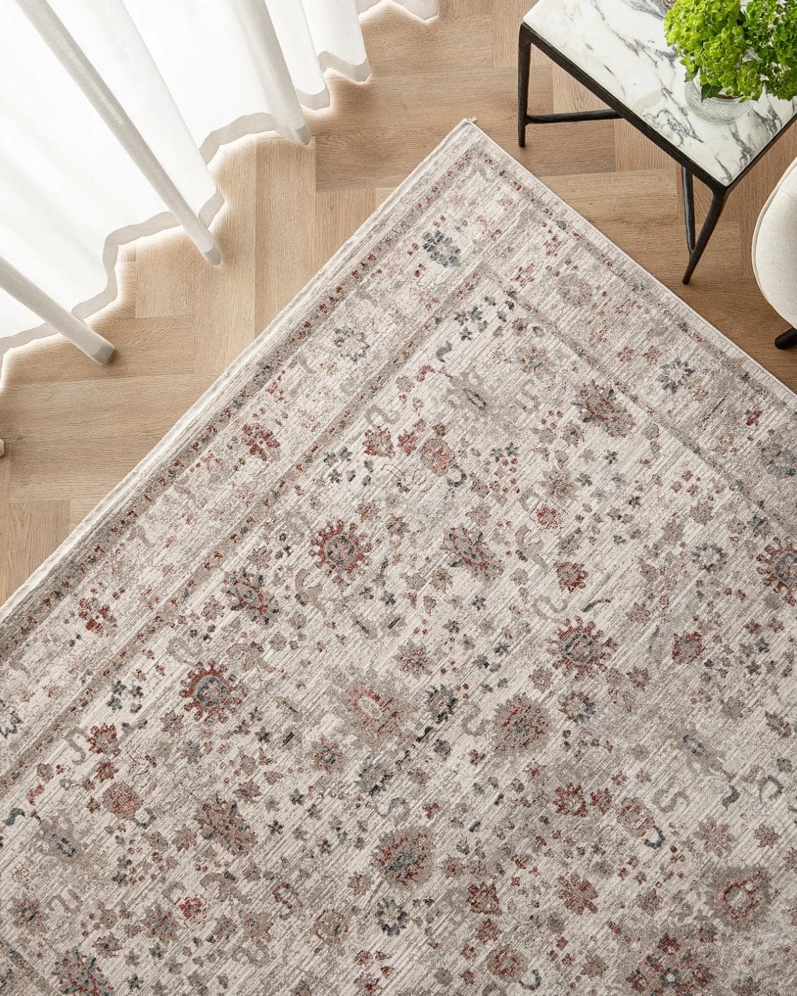 Alexander Dune carpet in red and beige, shown in a lifestyle top view as image 2