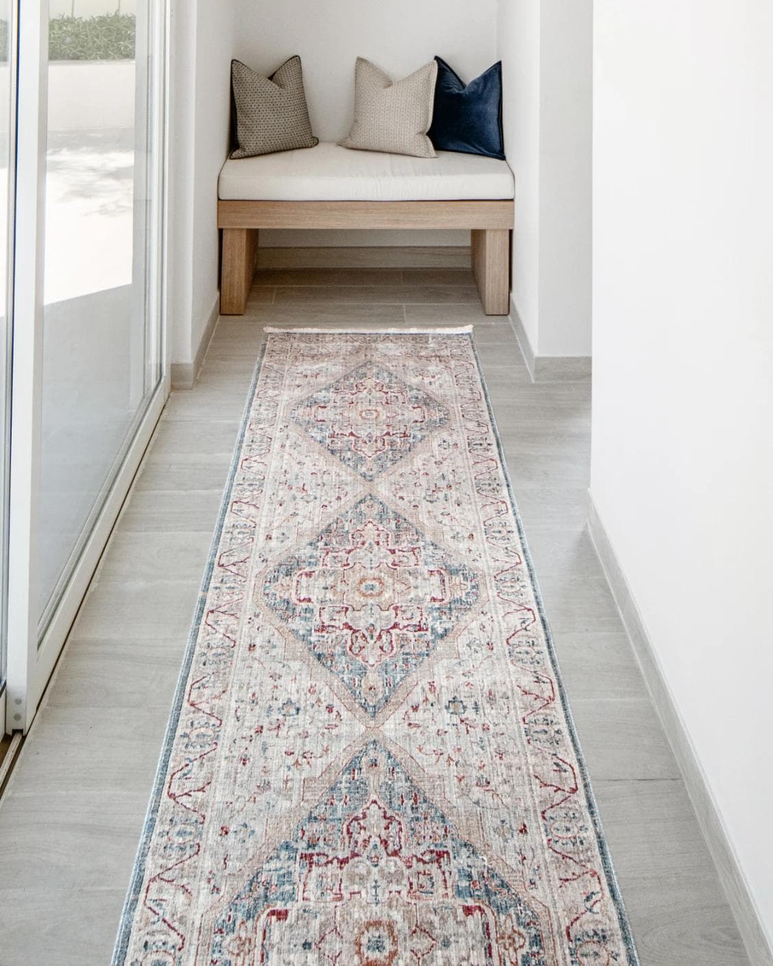 Alexander Rouge Runners carpet in beige, blue and red, shown in a lifestyle front view as image 2