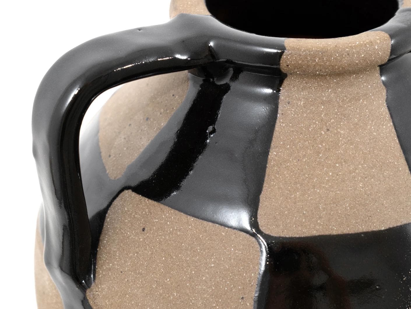 Alisca Terra vases in charcoal black, warm clay, brown and black, shown in a product close-up as image 7
