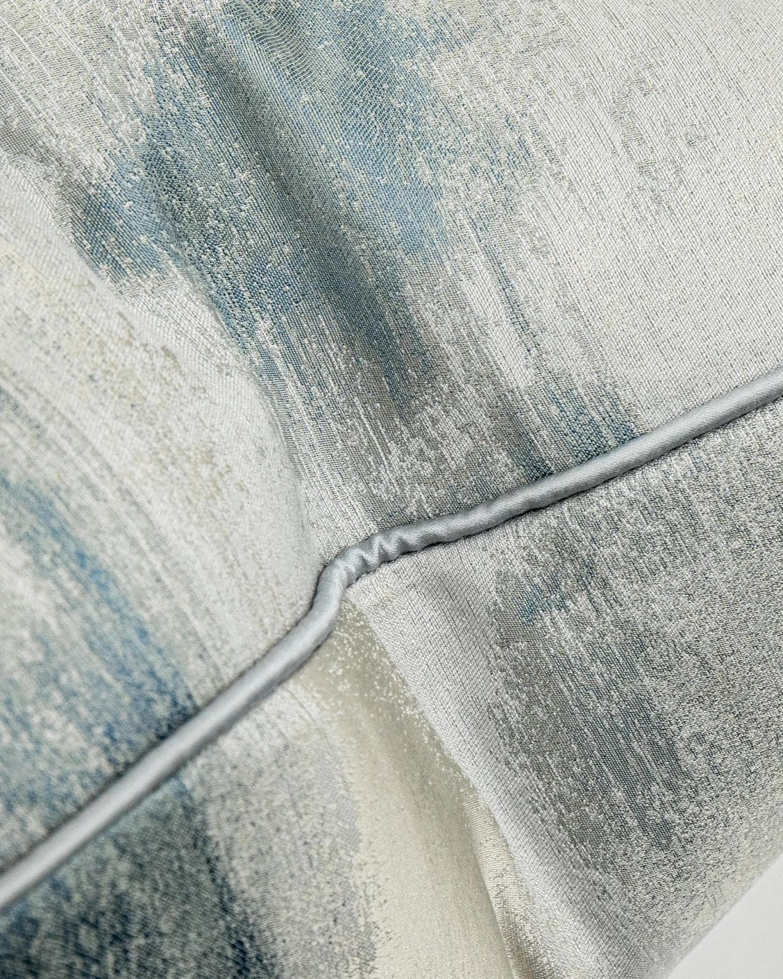 Alma Canova cushion in blue and silver, shown in a product close-up as image 7