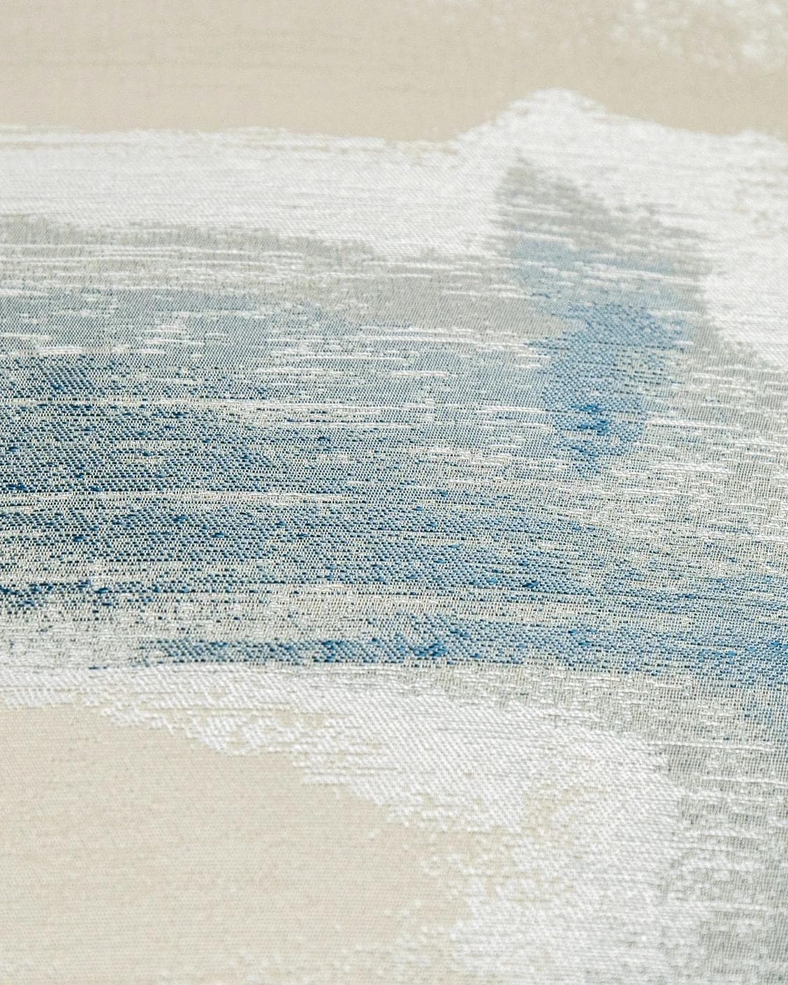 Alma Canova cushion in blue and silver, shown in a product close-up as image 8