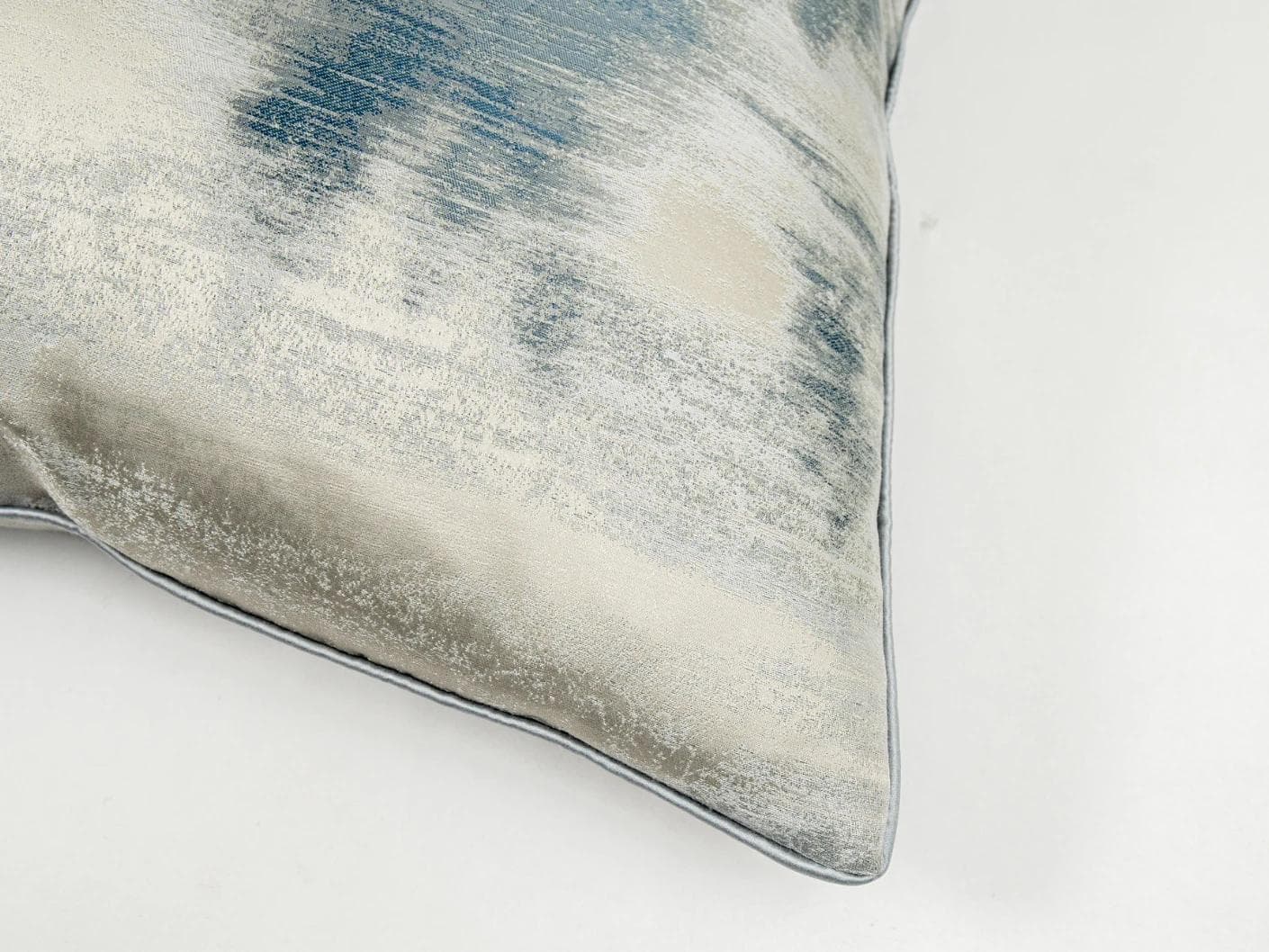 Alma Canova cushion in blue and silver, shown in a product top view as image 9
