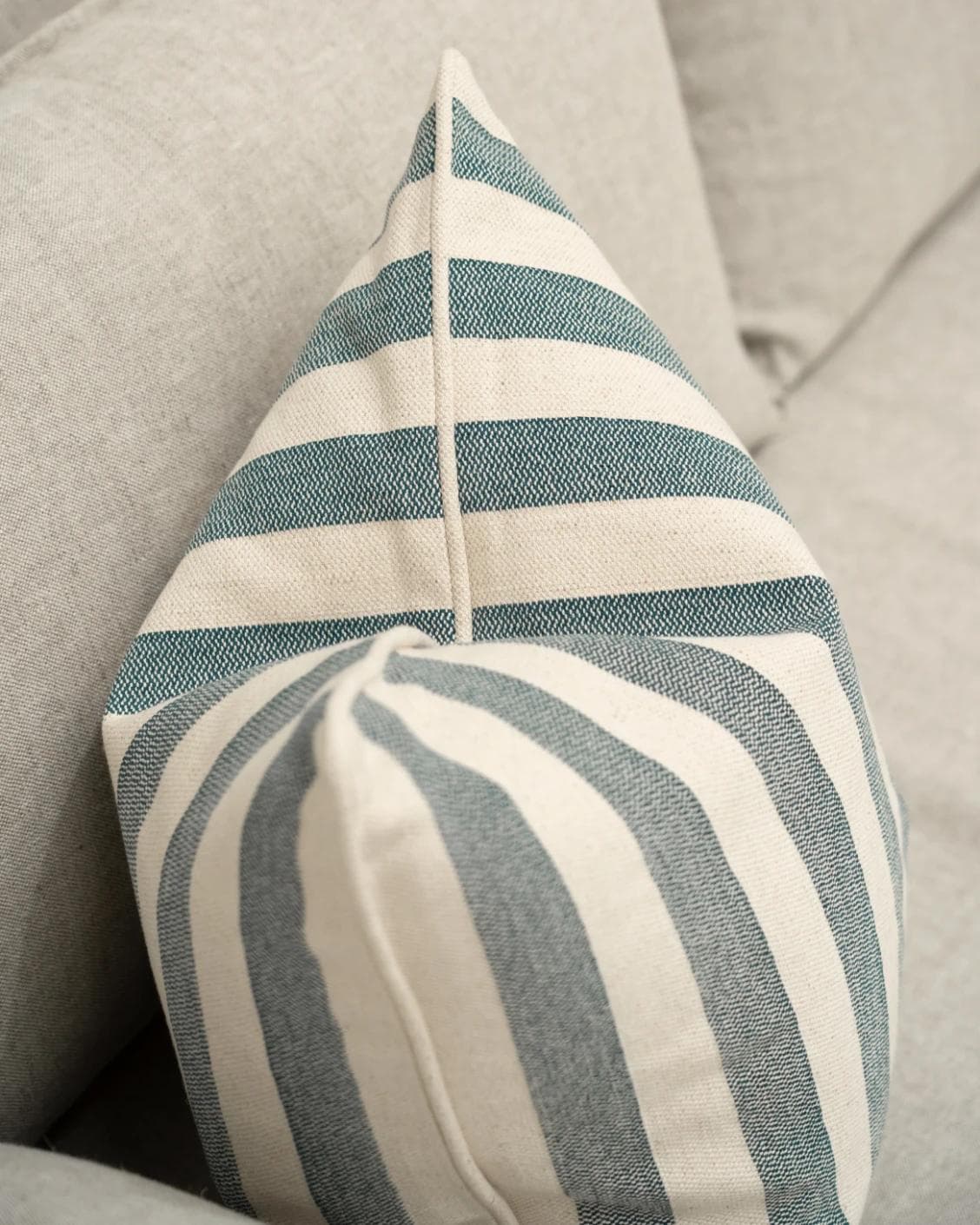 Ameline Canova cushion in blue, shown in a lifestyle top view as image 5