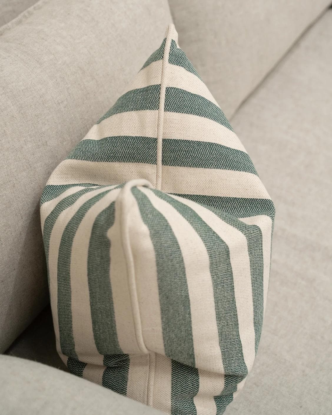 Ameline Forest cushion in forest green, shown in a lifestyle top view as image 5