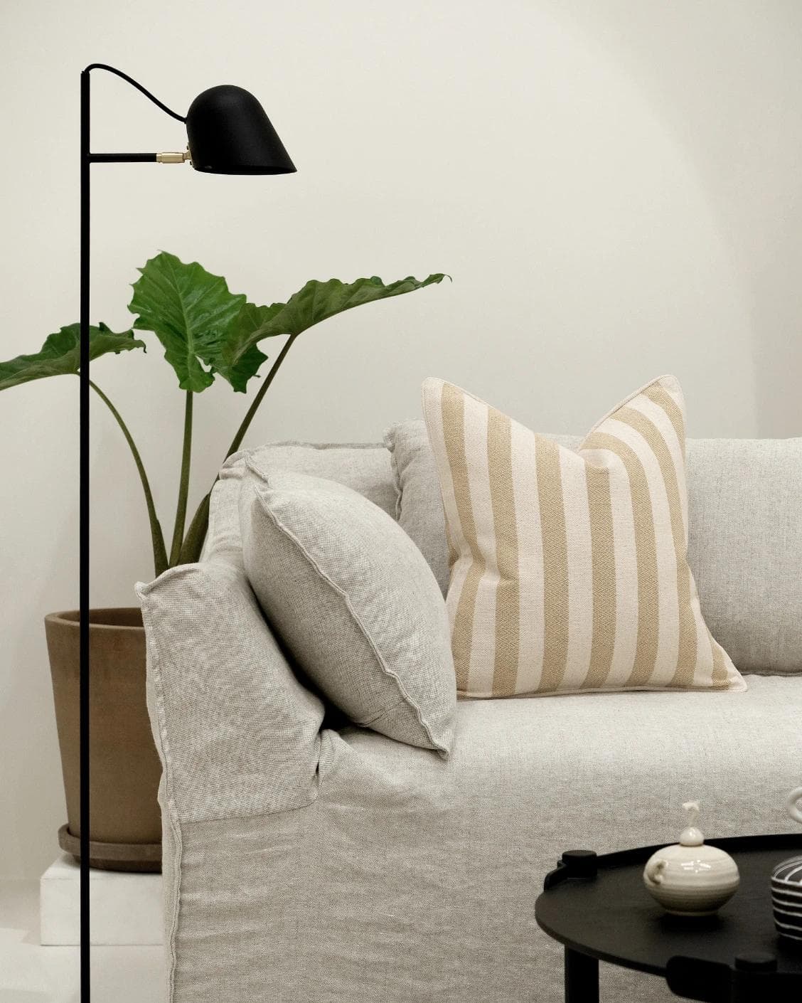Ameline Klimt cushion in beige, shown in a lifestyle front view as image 4