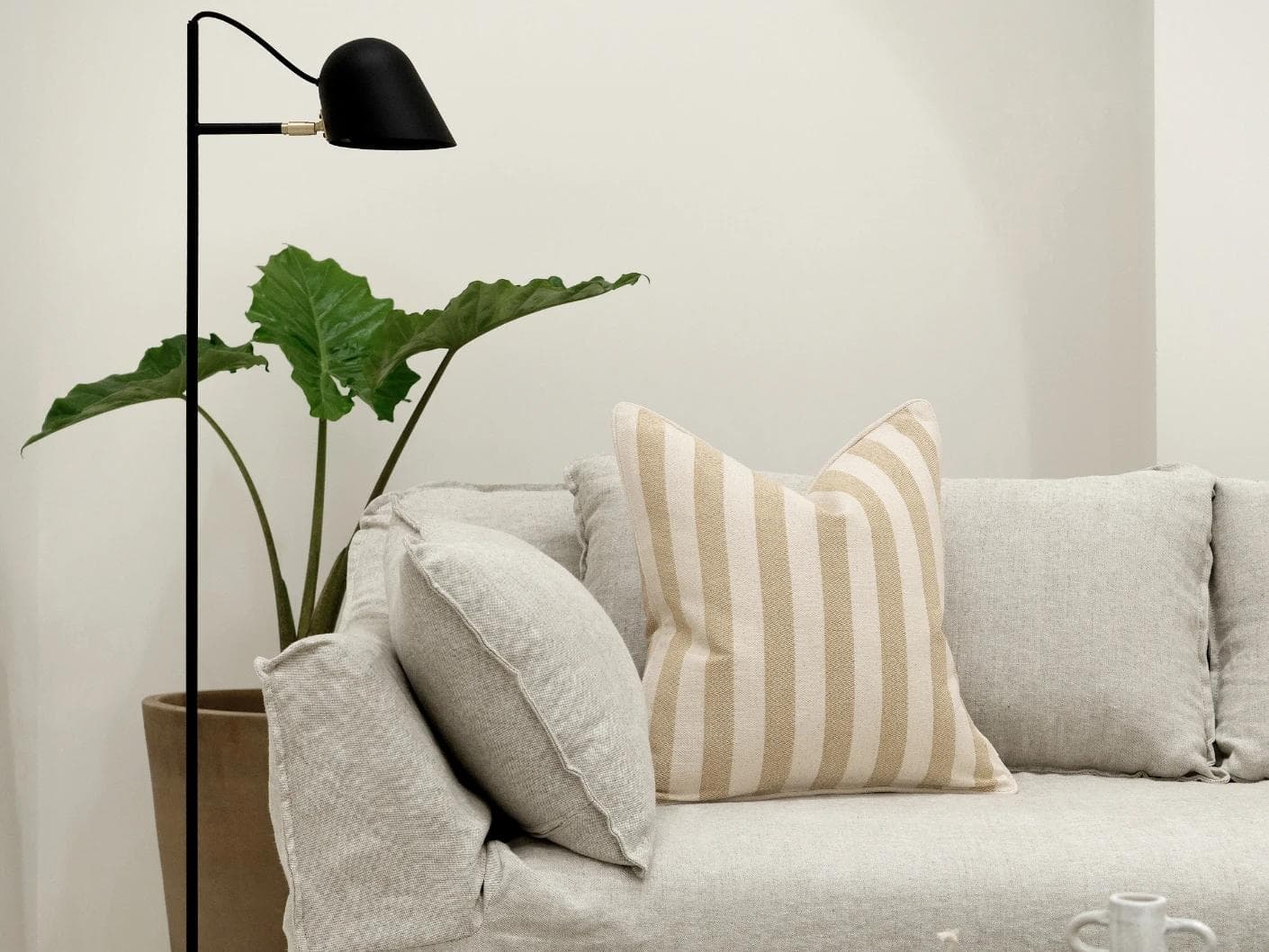 Ameline Klimt cushion in beige, shown in a lifestyle front view as image 4