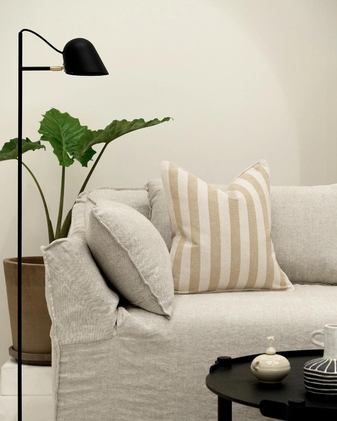 Ameline Klimt cushion in beige, shown in a lifestyle front view as image 5