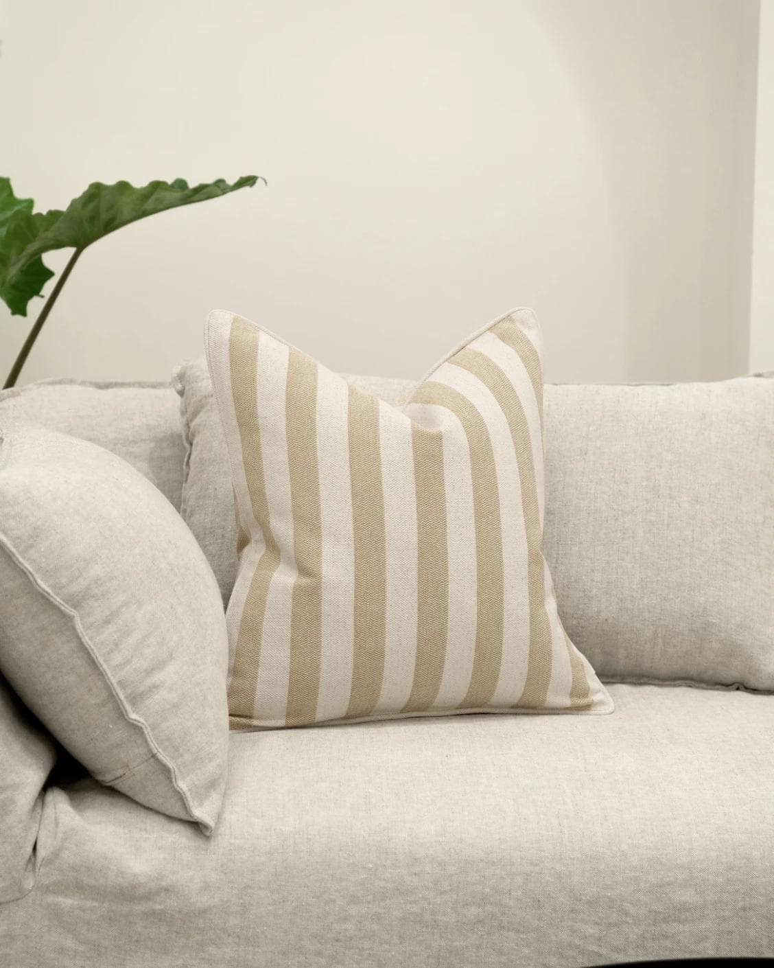Ameline Klimt cushion in beige, shown in a lifestyle front view as image 6