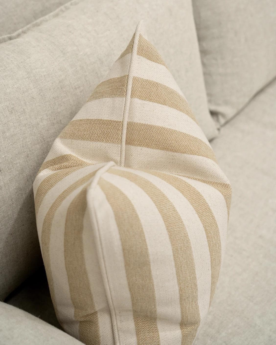Ameline Klimt cushion in beige, shown in a lifestyle top view as image 7