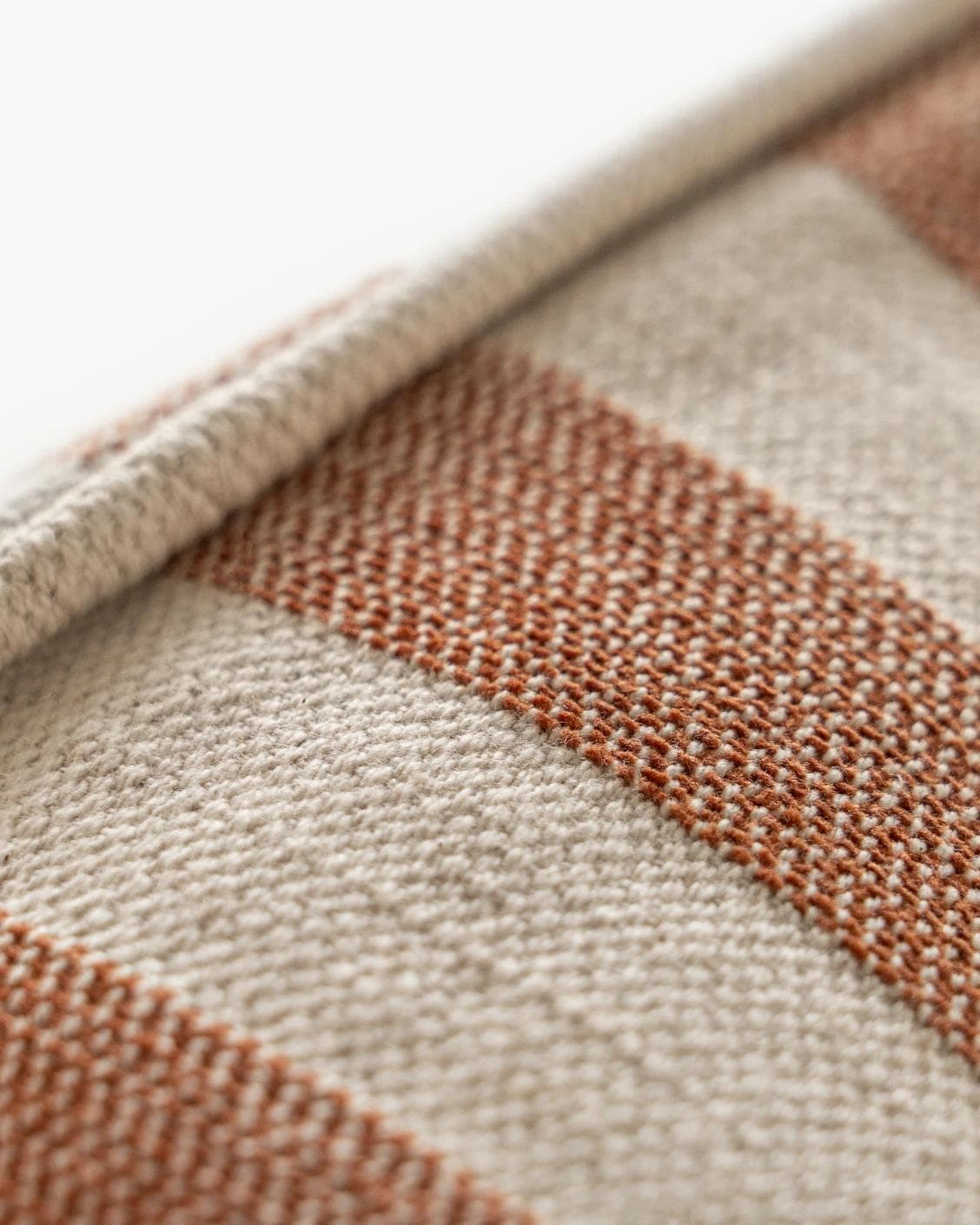 Ameline Rust cushion, shown in a product close-up as image 9