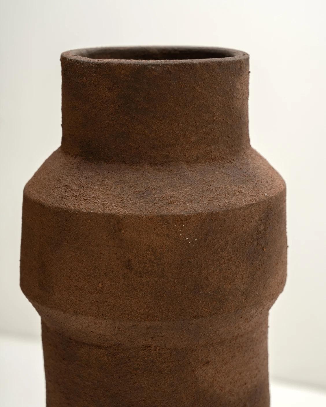 Anaya Arneson vases in rust and brown, shown in a product left view as image 6