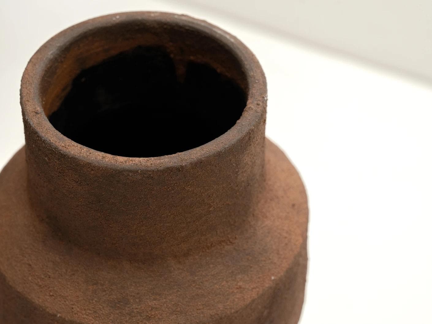Anaya Arneson vases in rust and brown, shown in a product top view as image 8