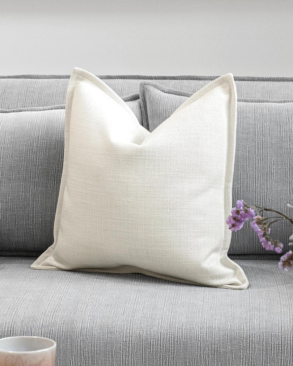Ansh Bundle cushion in yellow and white, shown in a lifestyle front view as image 5