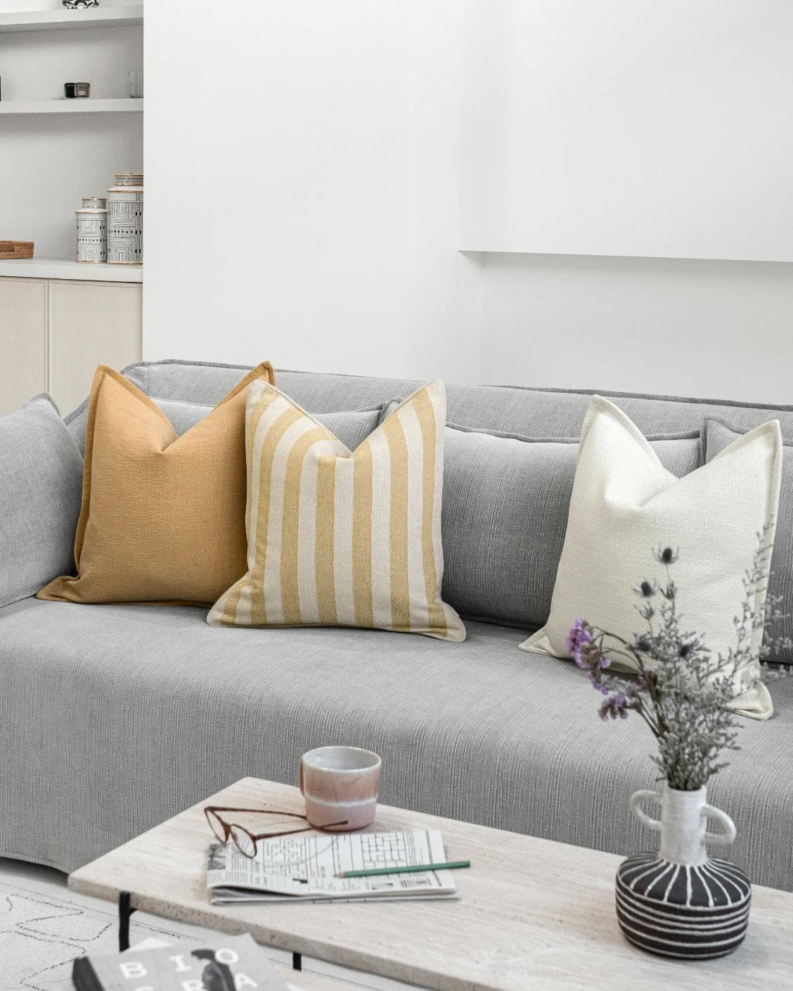 Ansh Bundle cushion in yellow and white, shown in a lifestyle right view as image 2