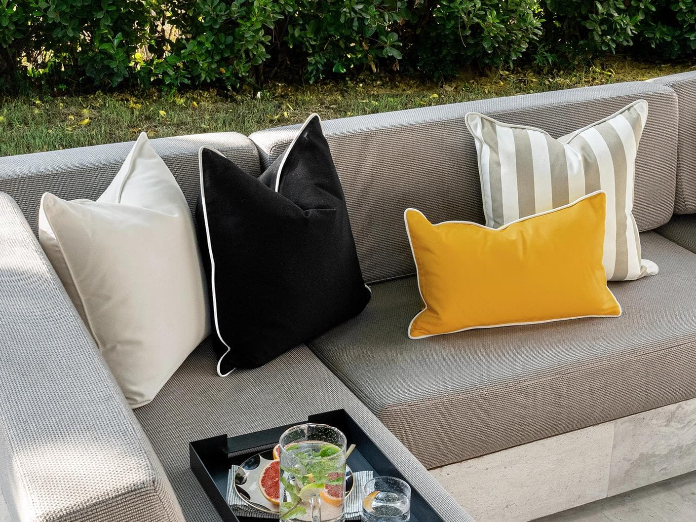 Apollo Bundle cushion in yellow, ivory, beige and black, shown in a lifestyle left view as image 5