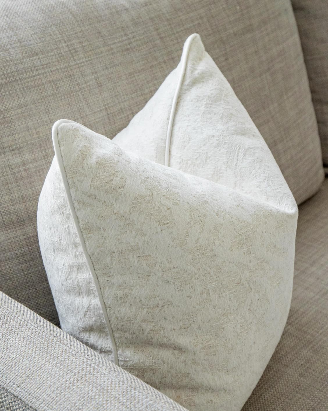 Arcie Bianca cushion in white, shown in a lifestyle left view as image 5